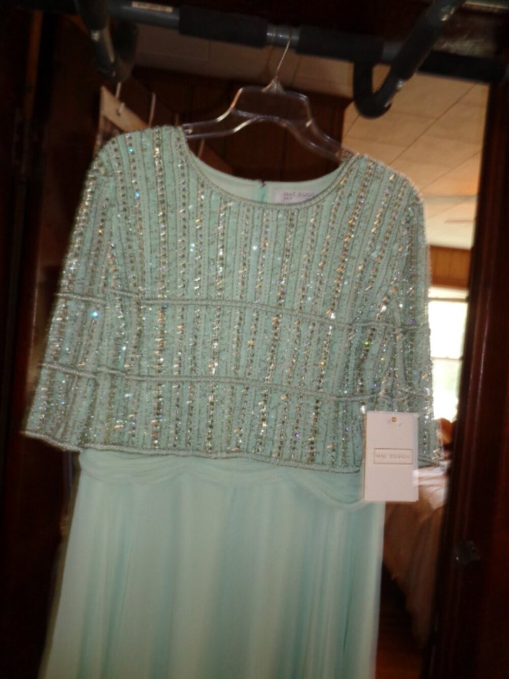 Bought it new as a second wedding dress but chose another dress for the ceremony
